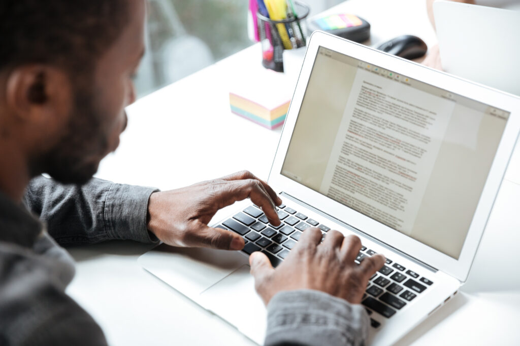 cropped photo serious young man sitting office coworking scaled